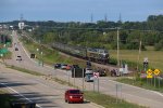 The foam is assembled at the 64th Ave crossing as P001 cruises by